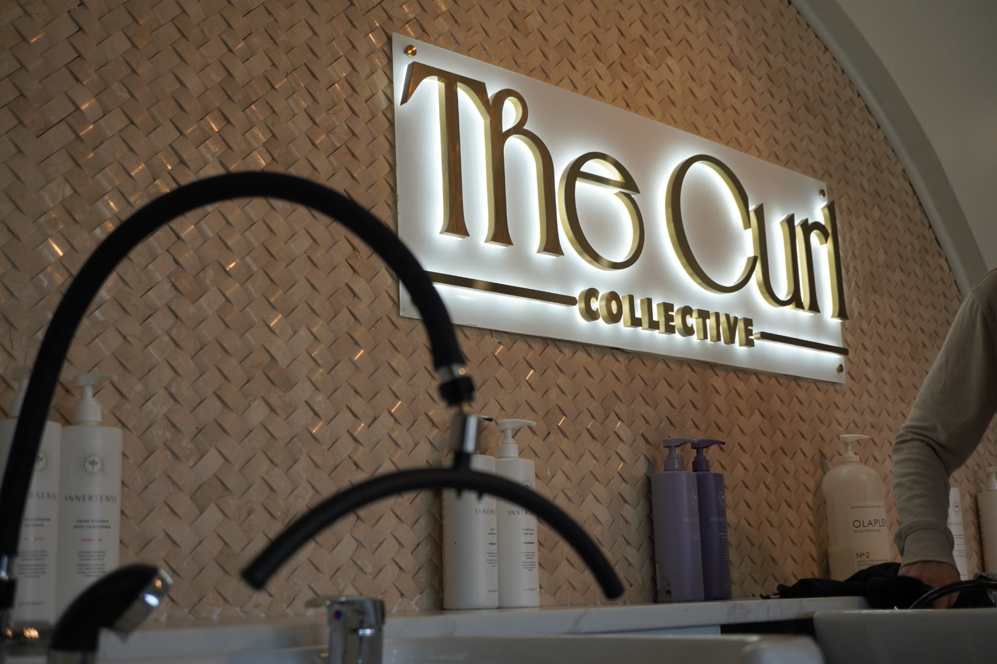 The Curl Collective salon interior