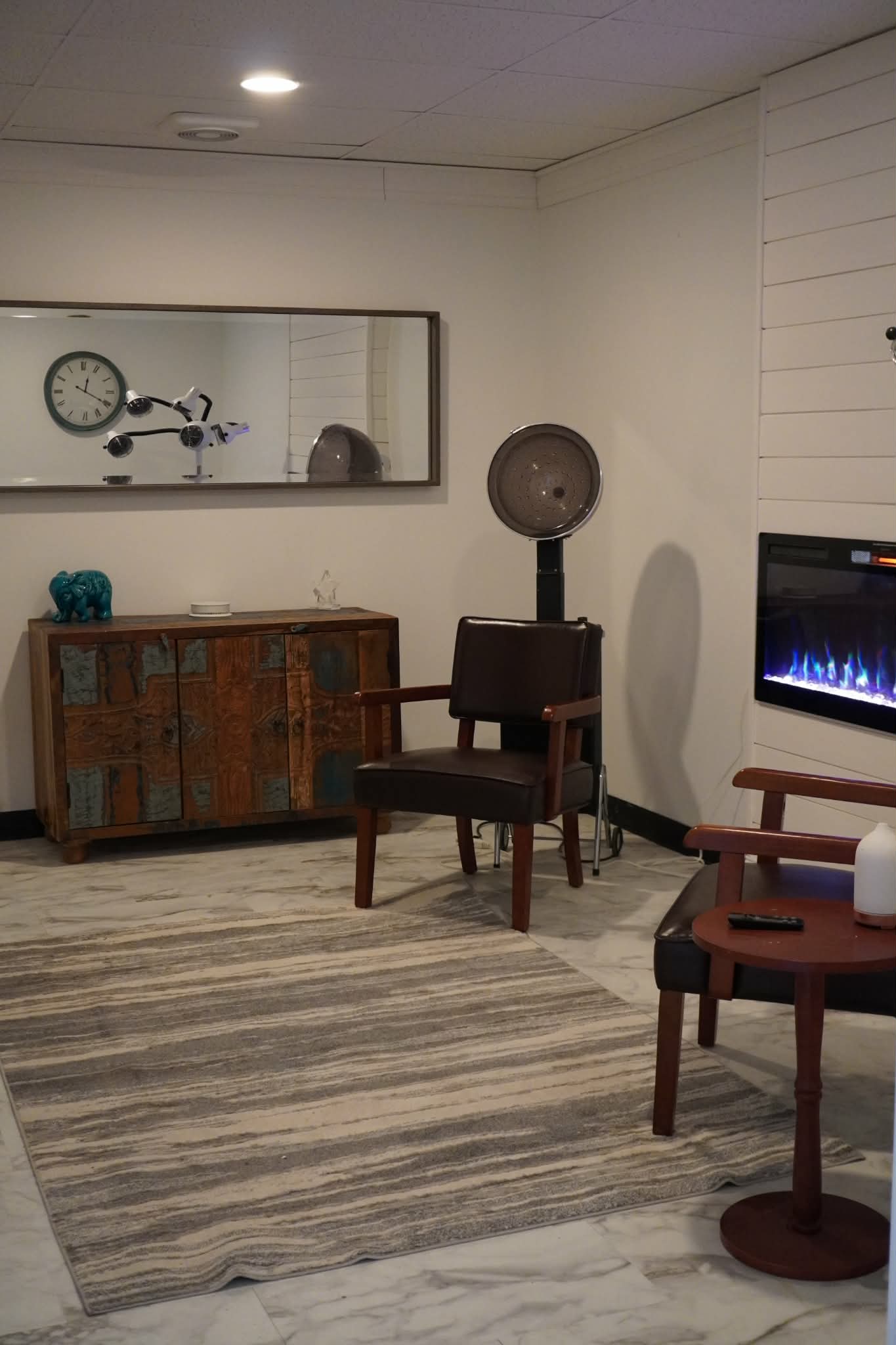 Salon waiting area with fireplace